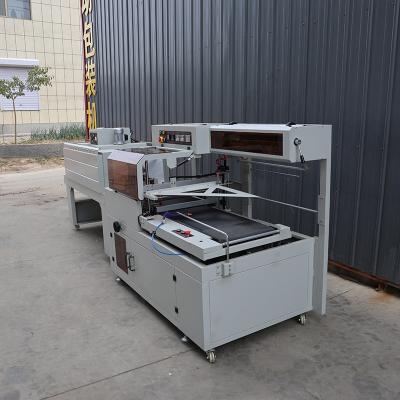 China PLC Control Auto Shrink Wrapping Machine Multifunctional Packaging Machine for sale