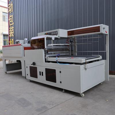 China Stainless Steel Shrink Wrapping Systems Thermal Contraction Film Packing Machine for sale