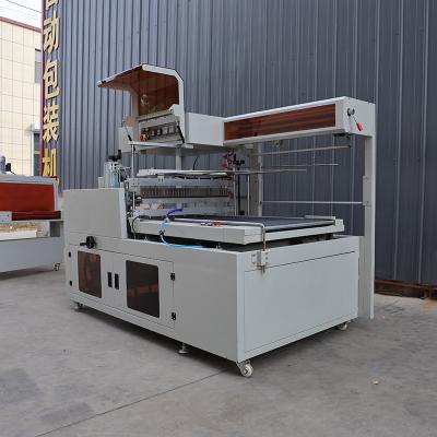 China Beverage Thermal Contraction Packaging Machine Customized Logo Film Wrapping Machine for sale