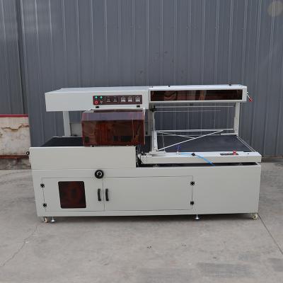 China Customized Automatic Plastic Wrap Sealer Machine POF / PE Film Shrink Wrapping Machine for sale