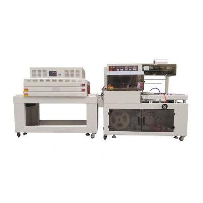 China 1.35KW Máquina de embalaje de encogimiento totalmente automática Máquina de embalaje de encogimiento por calor ISO9001 en venta