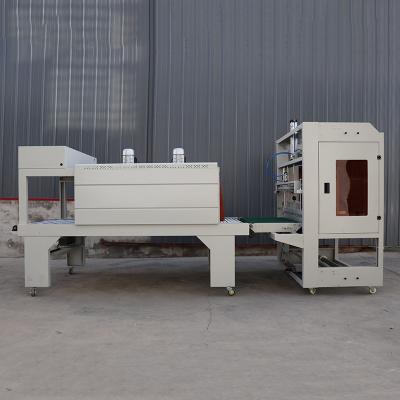 China Control PLC Máquina de embalaje semi-automática de encogimiento de película POF Máquina de embalaje multifunción en venta