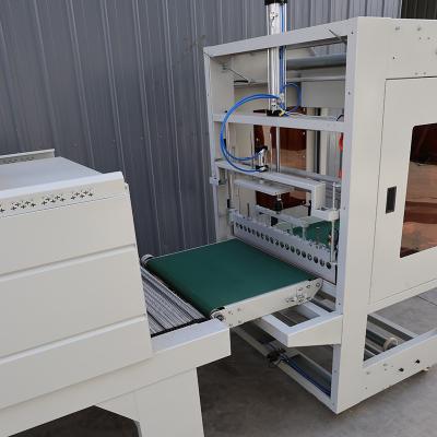 China Customized Semi Automatic Shrink Wrap Machine 220V Food And Beverage Packaging Machinery for sale