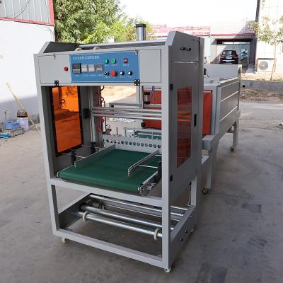 China Cuff Semi Automatic Packing Machine PE PVC POF Shrink Film Machine 50HZ / 60HZ for sale
