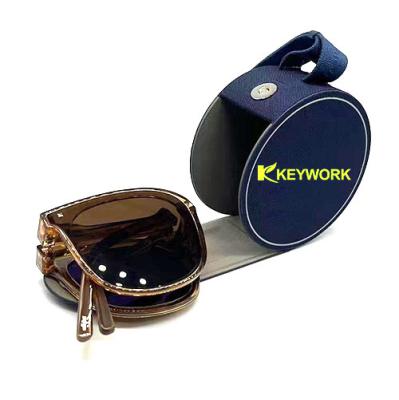 China PU Leather Circular Foldable Sunglasses Case Round Glasses Storage Box for sale