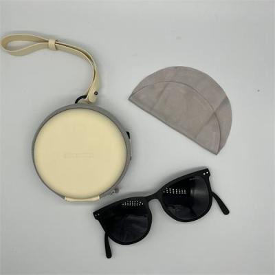 China Portable Removable Strap Fashionable Sport Skin-Friendly Synthetic Leather Circle Folding  Sunglasses Case for sale