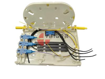 China 4 branco plástico da caixa OTB FTB104E da terminação da fibra ótica do porto para o cabo pendente 2*3MM de FTTH à venda