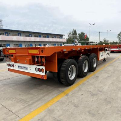 Chine Tri Axle Flatbed Truck Trailer 40 Ft 3 Axle Flat Bed Semi Trailer for Sale in Nigeria à vendre