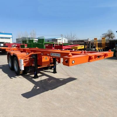 China TITAN 2/3/Tri Axle 20/40 Ft Shipping Container Chassis Skeletal Trailer for Sale Near Me en venta
