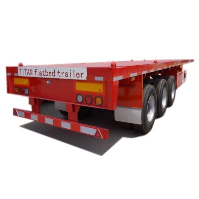 China Tri axle 40 ft container semi flatbed trailer manufacturers for sale for sale