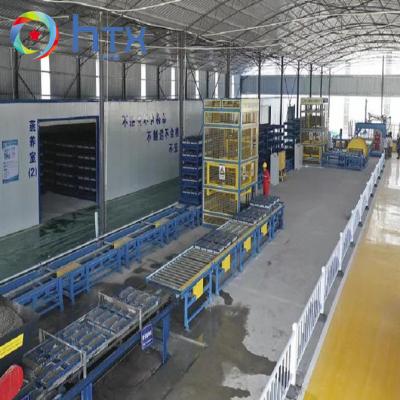 China Automatic Interlocking Tiles Making Machine Stacked Stone Concrete Sleepers Machine for sale