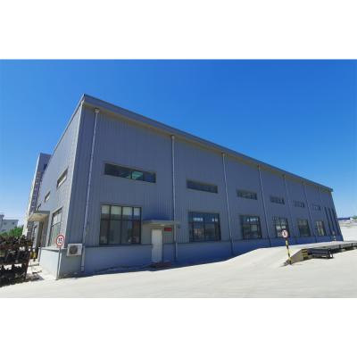 China Galvanised Steel Frame Snow Proof Industrial Peb Building Metal Warehouse for sale