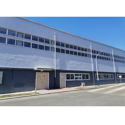 China Q345B Prefab Metal Building Kit Steel Frame Roof Portal Frame Warehouse for sale