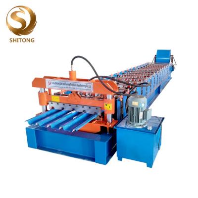 China 686 model automatic iron sheet trapezoid roof plate cold roll forming machine for sale