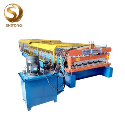 China trapezoidal profile four ribs metal roofing sheets roll forming machine for sale