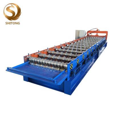 China 750 model aluminium profile cutting roof roll forming machine manufacturers for sale