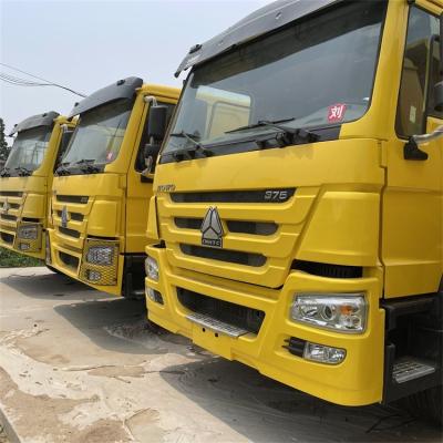 Chine Le bas camion à benne basculante d'occasion de kilomètrage a utilisé le camion de HOWO avec de nouveaux pneus utilisés à vendre