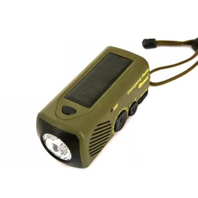 China 550mAh Solar Powered Flashlight USB Charging Hand Crank Flashlight Outdoor Survival Emergency Radio Flashlight for sale
