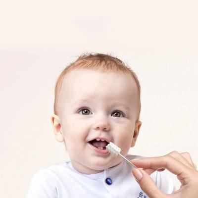 China Disposable Baby Oral Skimmed Gauze Cleaning Brush Cotton Swab Mouth Tongue Cleaner for sale