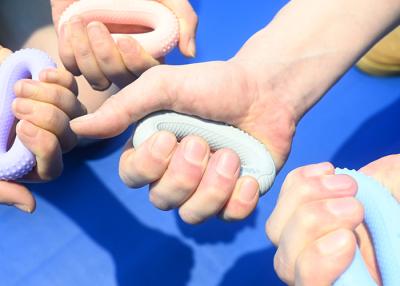 China Hand Squeeze Finger Strength Trainer Ring 2 Levels Finger Grip Strength Trainer for sale