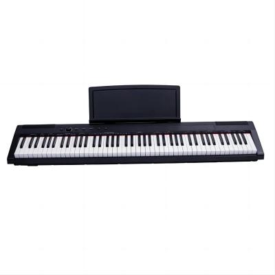 China Piano portátil digital pequeño Piano portátil de teclado de marco X para niños en venta