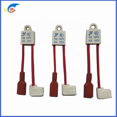China Ceramic 150℃ 250V 20A 30A 40A 50A 60A Thermal Cutoff Fuses Radial Thermal Fuse With Mounting Hole for sale