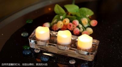 China A vela a pilhas do diodo emissor de luz Tealight que cintila, gosta do tealight votiva conduzido da vela à venda