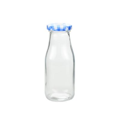 China 11oz BPA Free Glass Milk Bottles Reusable With Metal Twist Lids for sale