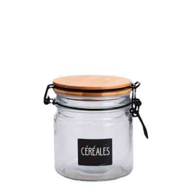 China 16OZ Wide Mouth Glass Food Storage Jars With Wooden Lids Silicone Gaskets for sale
