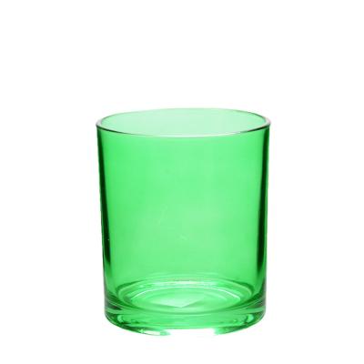 China Jarrón de velas de vidrio verde, meticulosamente hecho a mano en venta