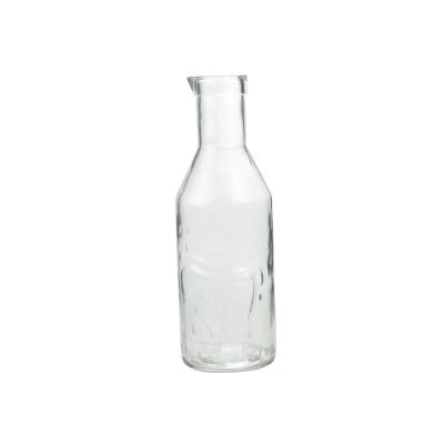 China 1 Liter Milk Glass Bottles Carafe Embossed Designed With Spout for sale