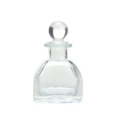 China Botella de difusor de aroma de vidrio transparente hermético para el difusor de caña cuadrado personalizado en venta