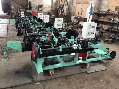 China Full Automatic Double Standard Twisted Barbed Wire Making Machine for sale