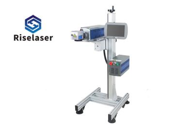 China Permanent 30w Co2 Flying Laser Marking Machine For Plastic Paper Packaging Line for sale