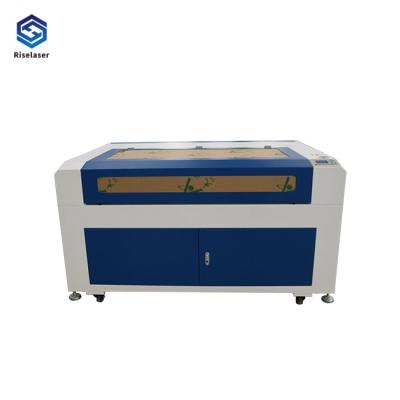 China Máquina de corte 100W do laser do CO2 da cama lisa opcional para cima e para baixo o Worktable à venda