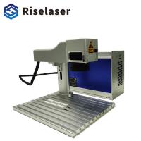 China Split Design 30W Fiber Laser Marking Machine Desktop Fiber Laser Engraver for sale