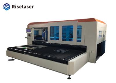 China Tipo incluido cortadora del laser de la fibra con Platfrom de trabajo doble 1kw en venta