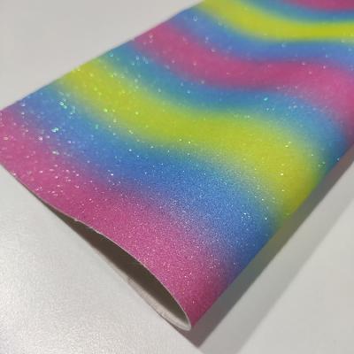 China Rainbow 0.65mm Abrasion Resistant Glitter Leather Fabric for sale