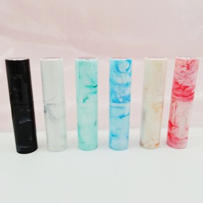 China Plastic Injection Marble Pattern Refillable Perfume Bottle Customized Color 8ml for sale