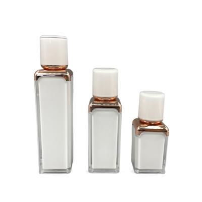China 15ml 30ml Airless Empty Makeup Bottles Double Wall Square ABS Cap for sale