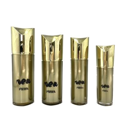 China Special Shape Cosmetic Pump Bottle Gold Refillable Cosmetic Containers 80ml 100ml for sale