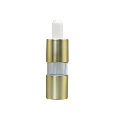 China Gold Empty Essential Oil Bottle 20ml 0.25ml Dosage UV Coating Liquid Dropper With Bulb for sale
