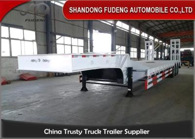 China Rampas hidráulicas 60 toneladas de la cama de remolque bajo semi, remolque plano bajo de la suspensión del aire en venta