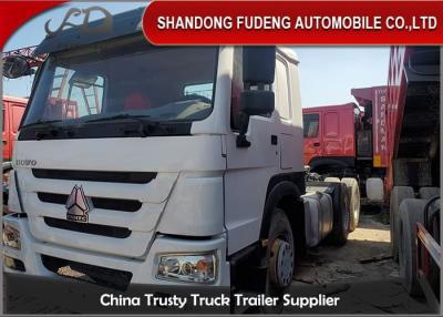 China Camiones principales usados impulsión manual del tractor de la rueda de 371HP 6X4 en venta