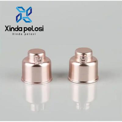 China Plastic Cosmetic Bottle Caps PP Lid Electroplating Aluminium Bell Shape Cap UV Flip Top Lid for sale