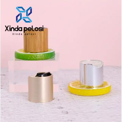 China Best Price Brushed Chrome Rose Gold Aluminum Disc Top Cap Cosmetic Bottle Cap On Sale for sale