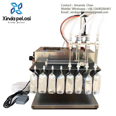 China Automatic Magnetic Stand Up Spout Pump Water Oil Yogurt Pouch Filling Packing Machine Te koop