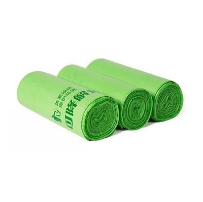 China Biodegradable PLA Garbage Bin Liner On Roll Printable Green Color for sale