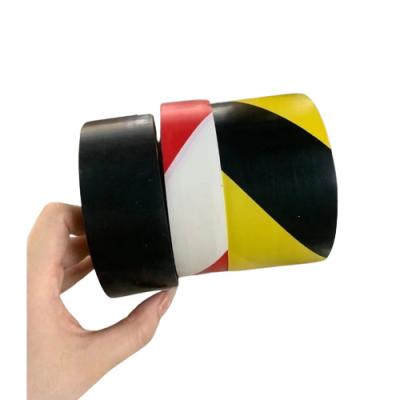 China Tela de advertencia de circulación impresa con cinta BOPP en rollo negro y amarillo en venta
