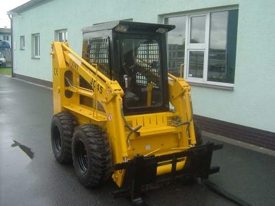 China Hydraulic Electric Skid Steer Loader , 20 ° Grade Ability Skid Steer Track Loader for sale